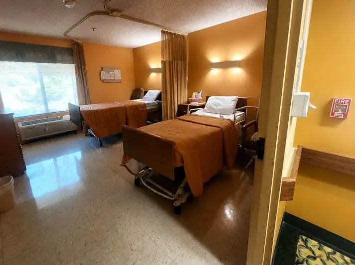 A semi-private resident room at Vivo Healthcare West Orange